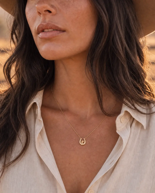 Horse Girl At Heart Horseshoe Necklace with gold-tone pendant on a delicate chain on Tampa Home & Garden Store