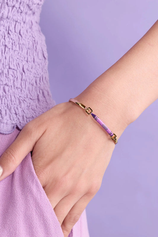 Crayola Royal Purple Crayon Tension Bangle on wrist with gold-tone hardware by Alex and Ani on Tampa Home & Garden Store