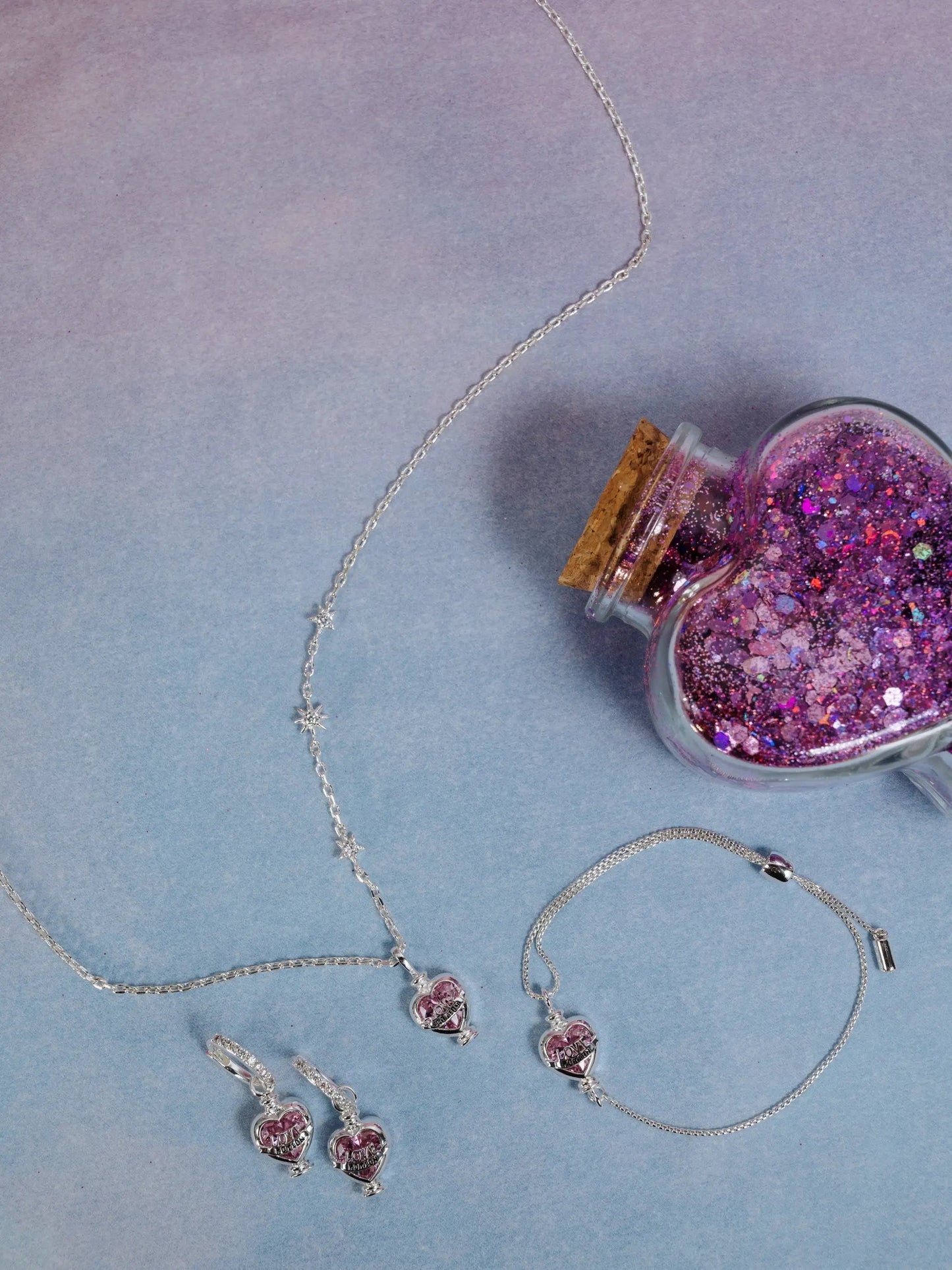 Harry Potter Love Potion Crystal Pull Chain Bracelet with pink crystal hearts and star on Tampa Home & Garden Store