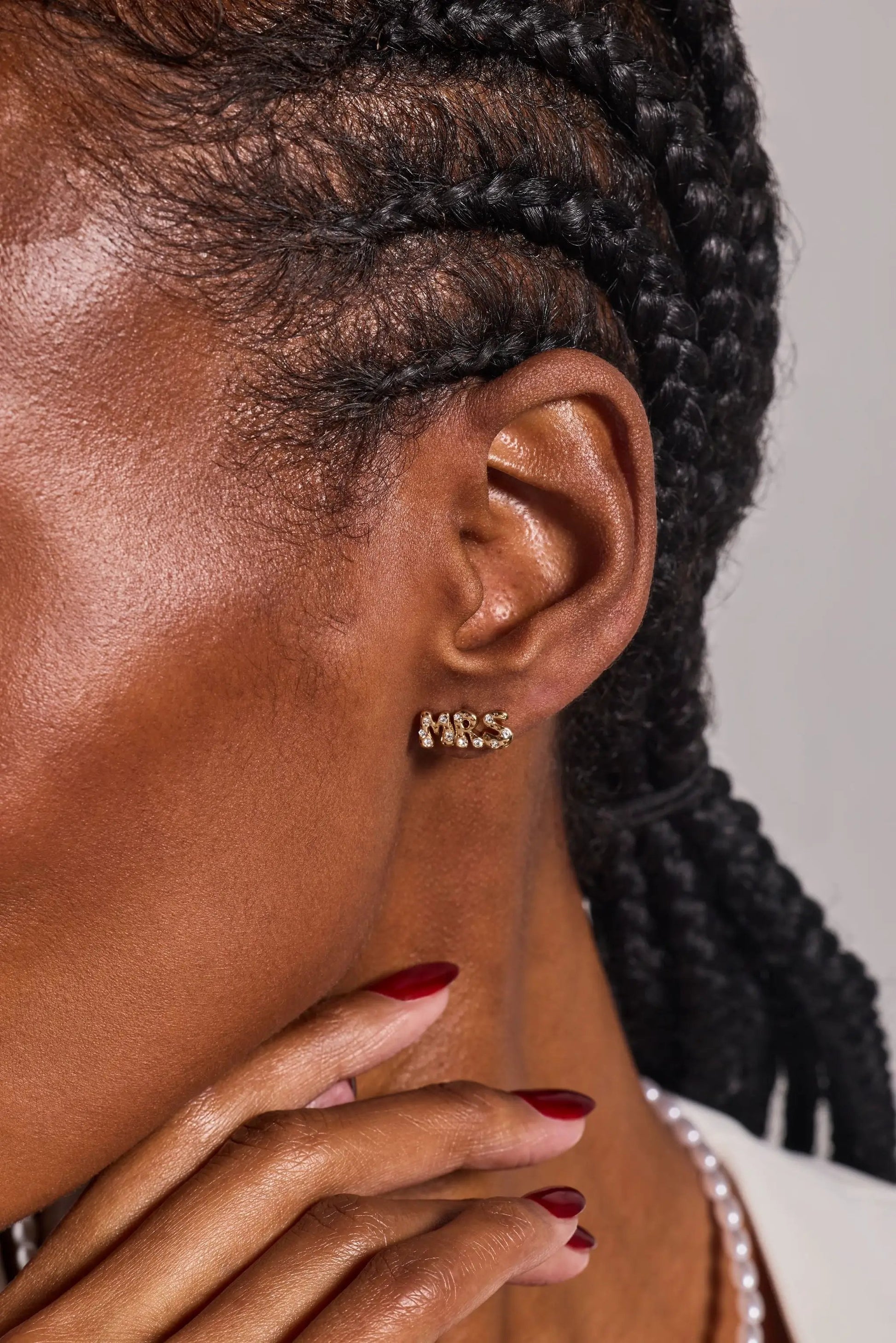 Mrs' Bubble Crystal Stud Earrings by ALEX AND ANI; gold-tone crystal MRS letters on earlobe on Tampa Home & Garden Store