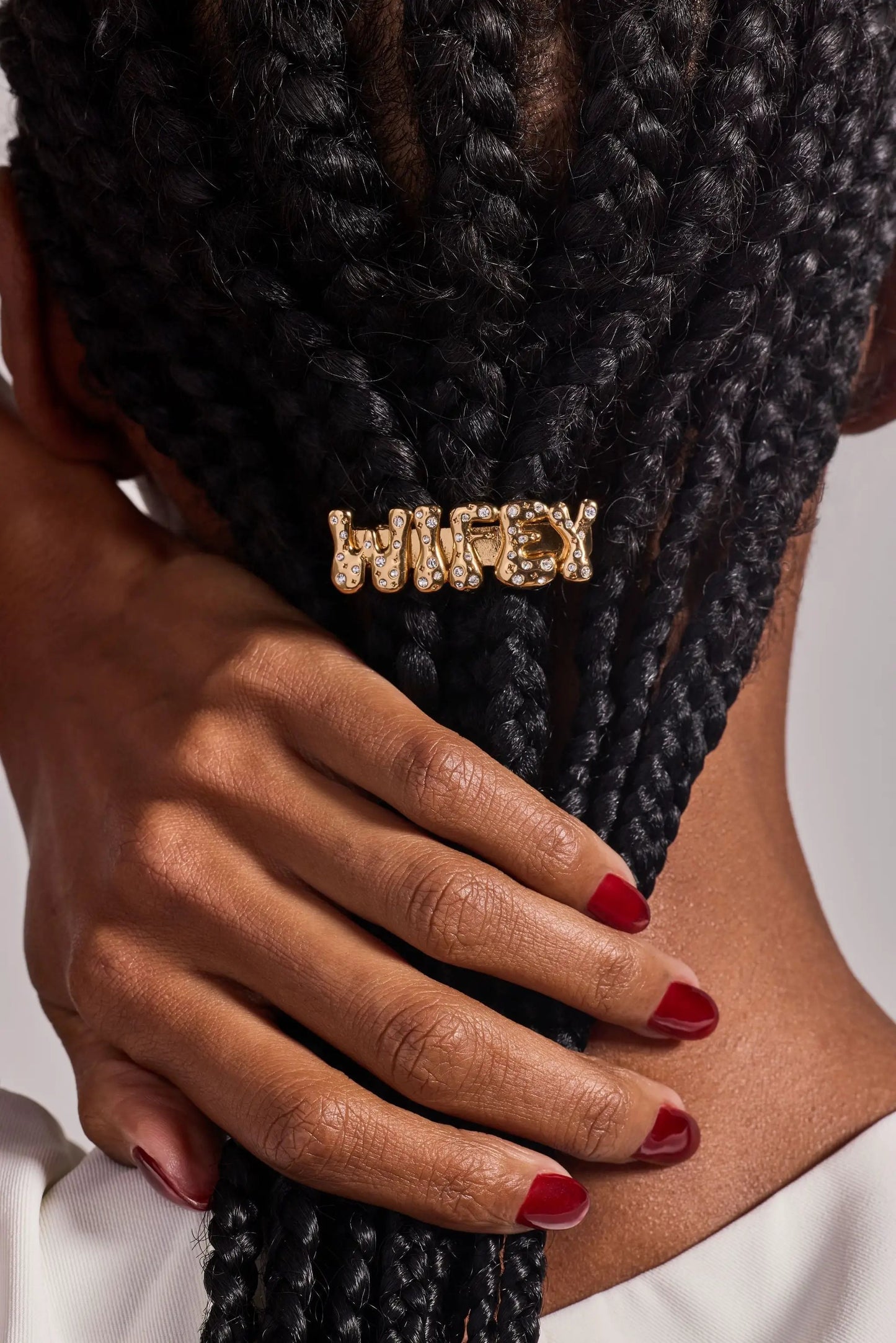 Wifey bubble hair barrette in gold with rhinestones securing thick black braids on Tampa Home & Garden Store