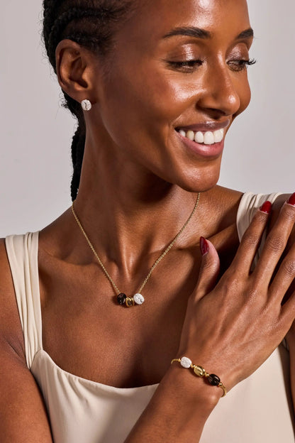 Coffee bean engraved pendant necklace by Alex and Ani with bead charms on gold-tone chain on Tampa Home & Garden Store
