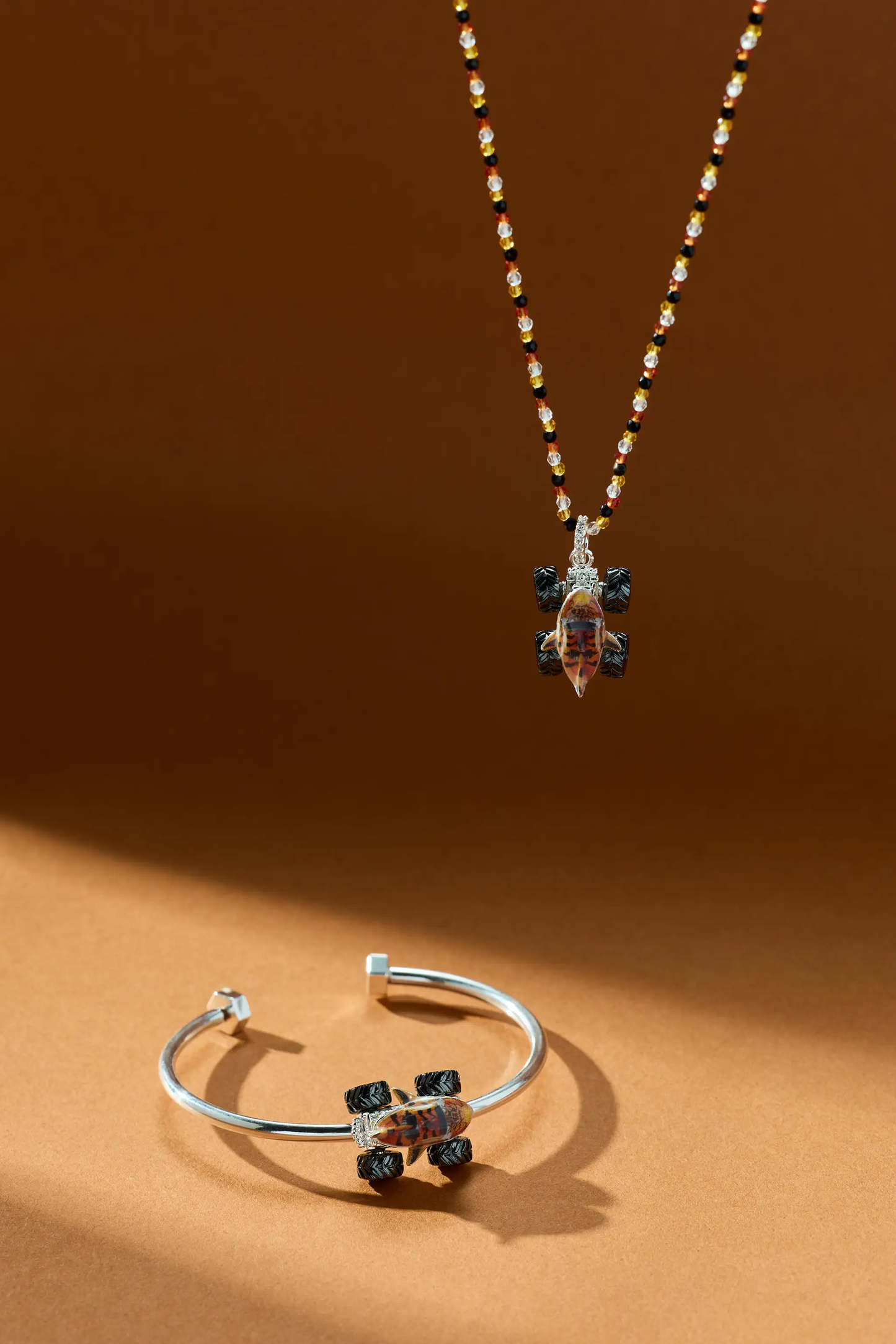 Hot Wheels Tiger Shark pendant necklace by Alex and Ani with amber, black and clear beads on Tampa Home & Garden Store