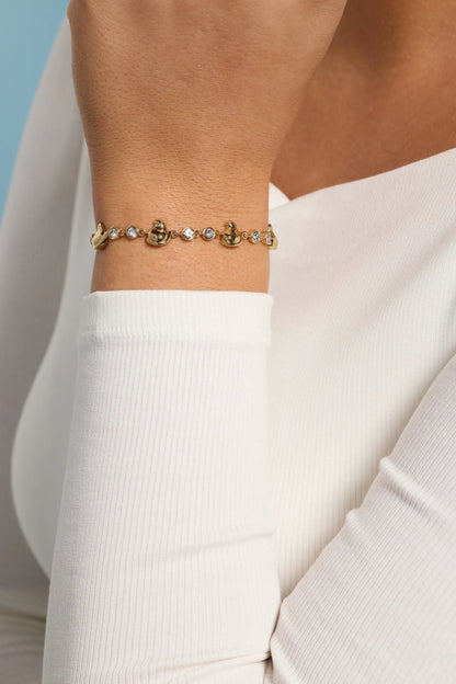 Peeps Chick Bolo Bracelet by ALEX AND ANI, gold-tone with crystal accents and chick charms on wrist on Tampa Home & Garden Store
