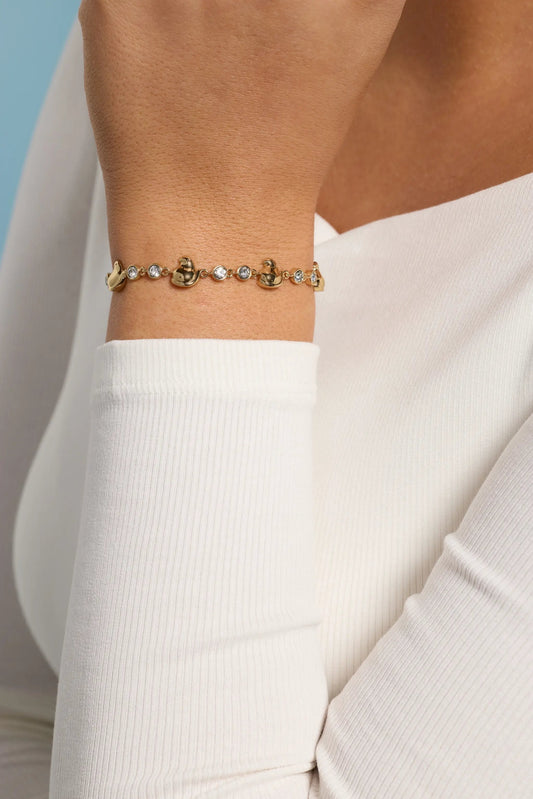 Peeps Chick Bolo Bracelet by ALEX AND ANI, gold-tone with crystal accents and chick charms on wrist on Tampa Home & Garden Store