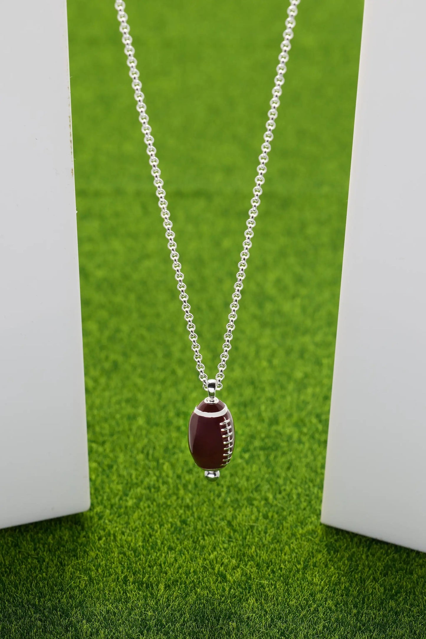 Football Spinner Pendant necklace by Alex and Ani with brown football charm on silver chain on Tampa Home & Garden Store