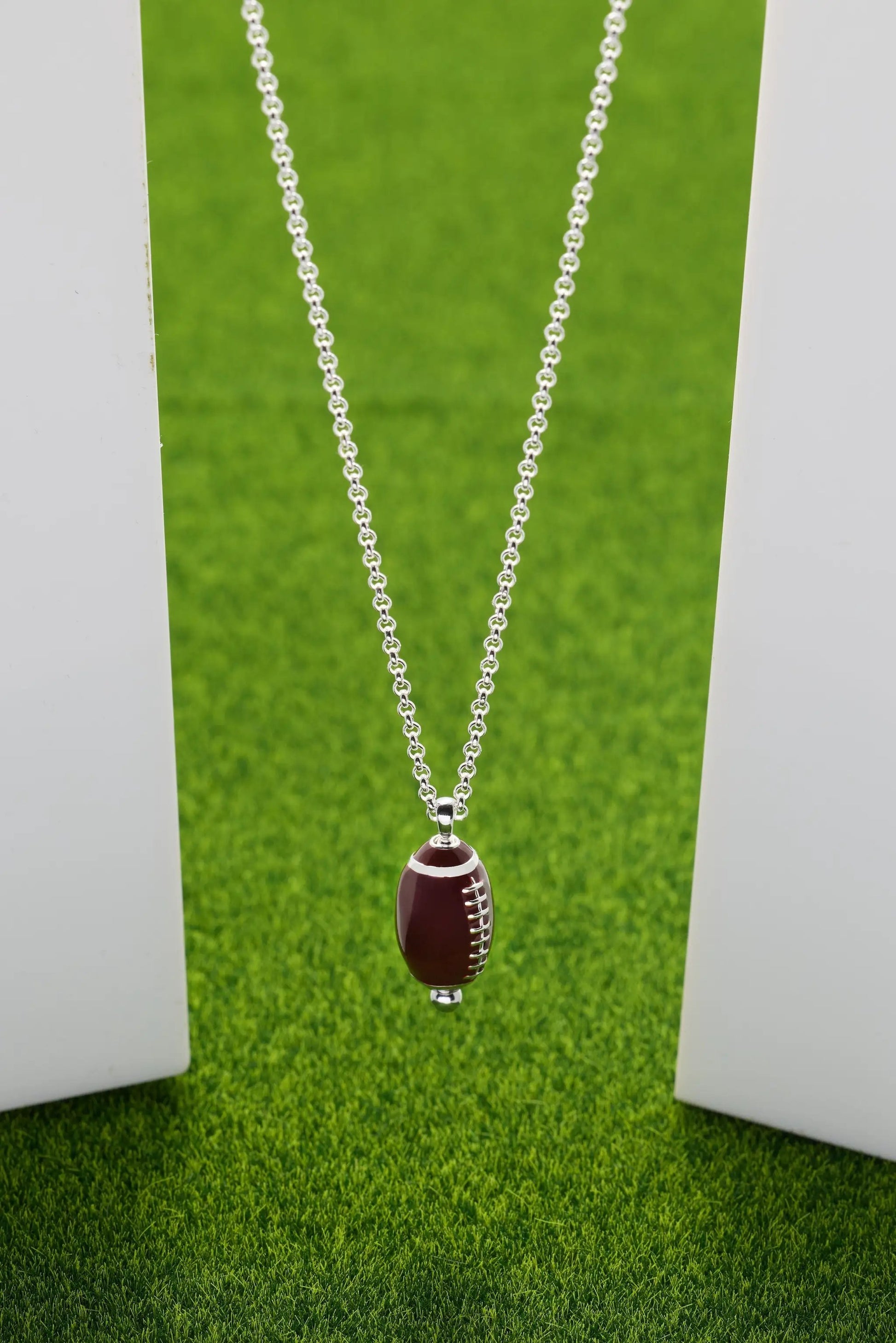 Football Spinner Pendant necklace by Alex and Ani with brown football charm on silver chain on Tampa Home & Garden Store
