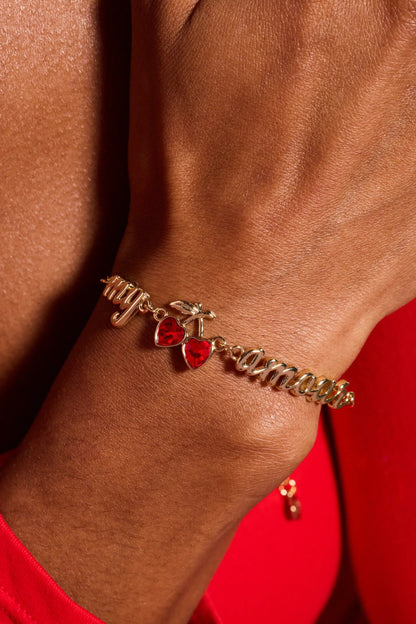 My Cherry Amour In-Line Chain Bracelet by Alex and Ani with red heart charms on gold-tone links on Tampa Home & Garden Store