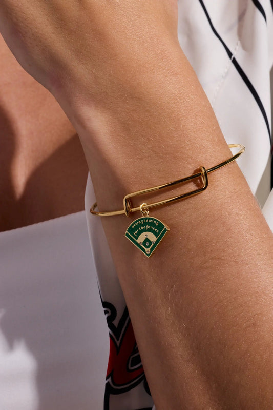 Gold tone Always Swing for the Fences charm bangle with green enamel baseball charm on Tampa Home & Garden Store