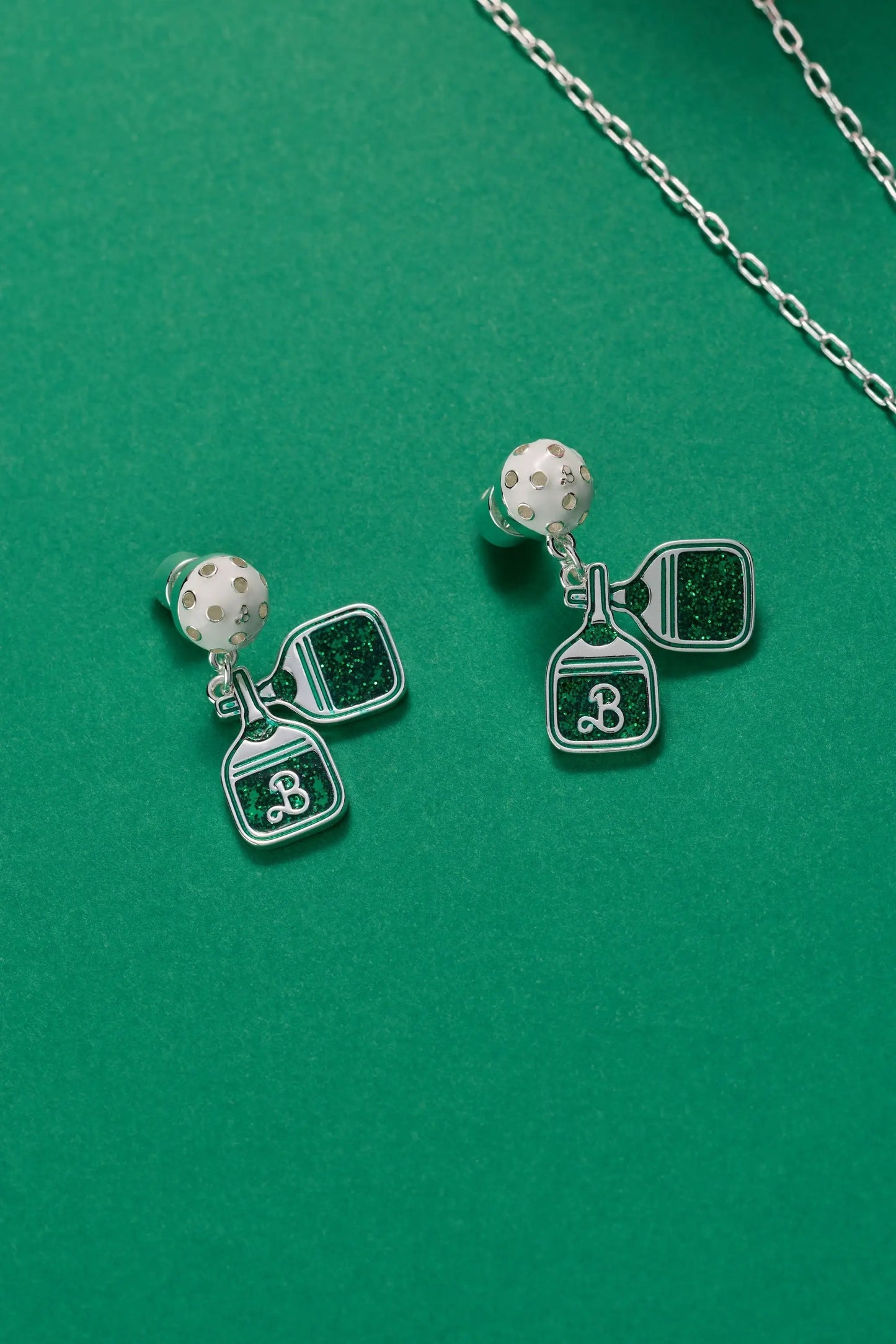 Barbie Pickleball Earrings by ALEX AND ANI with white pickleball studs and glitter pendants on Tampa Home & Garden Store
