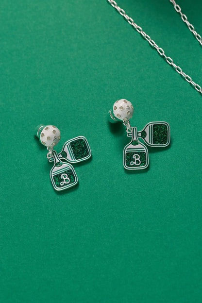 Barbie Pickleball Earrings by ALEX AND ANI with white pickleball studs and glitter pendants on Tampa Home & Garden Store