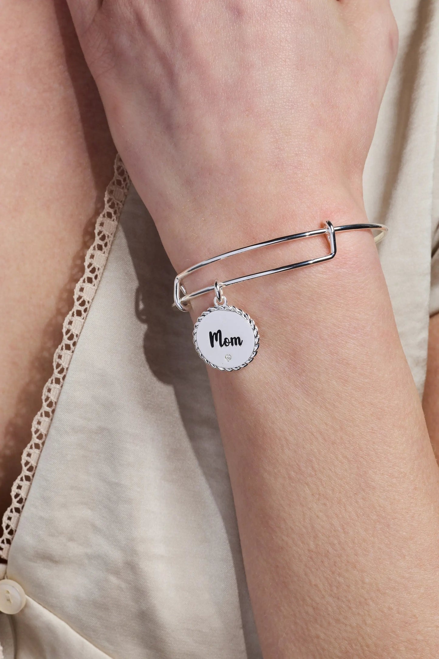 Bracelet: Alex and Ani Bonded By Love Mom charm bangle, silver tone with round white Mom pendant on Tampa Home & Garden Store