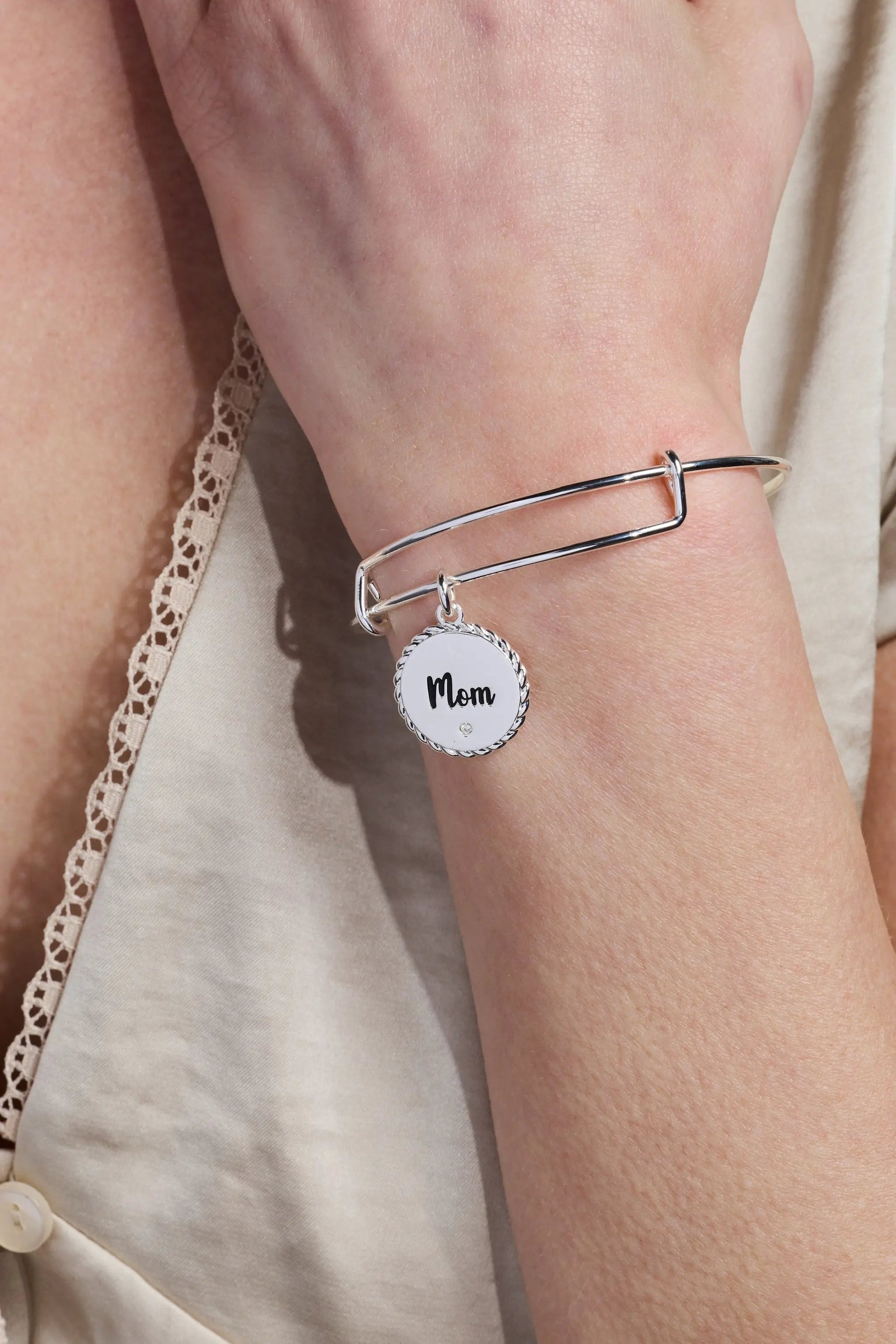 Bracelet: Alex and Ani Bonded By Love Mom charm bangle, silver tone with round white Mom pendant on Tampa Home & Garden Store