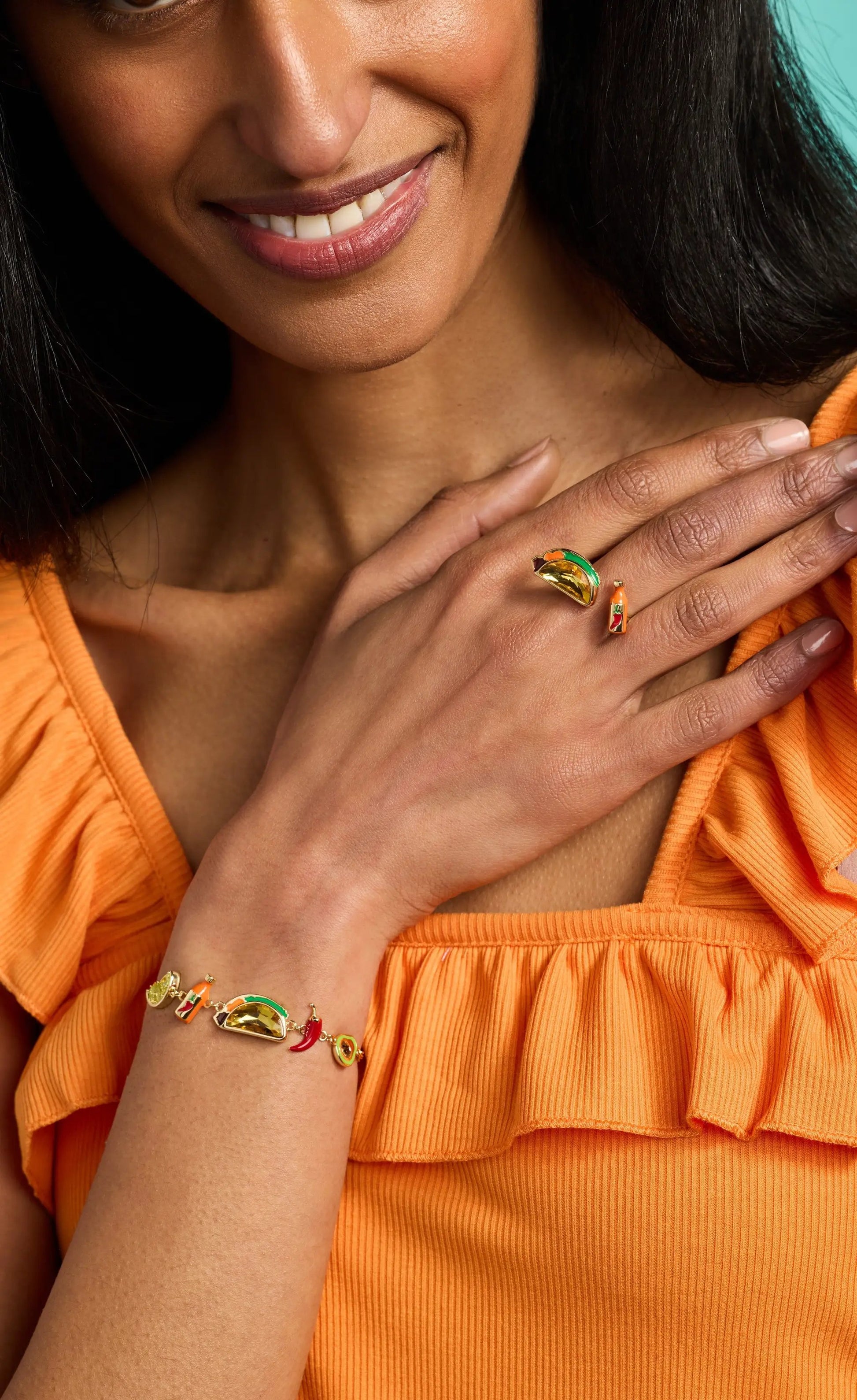 Taco Open Ring by Alex and Ani in gold-tone with green enamel accent worn on finger on Tampa Home & Garden Store