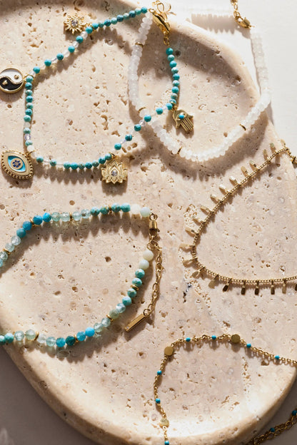 Healing Stone Charm Anklet by ALEX AND ANI in turquoise and white beads with gold charms on Tampa Home & Garden Store