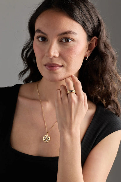 Chess Fidget Ring gold-tone band with engraved detailing worn on finger by ALEX AND ANI on Tampa Home & Garden Store