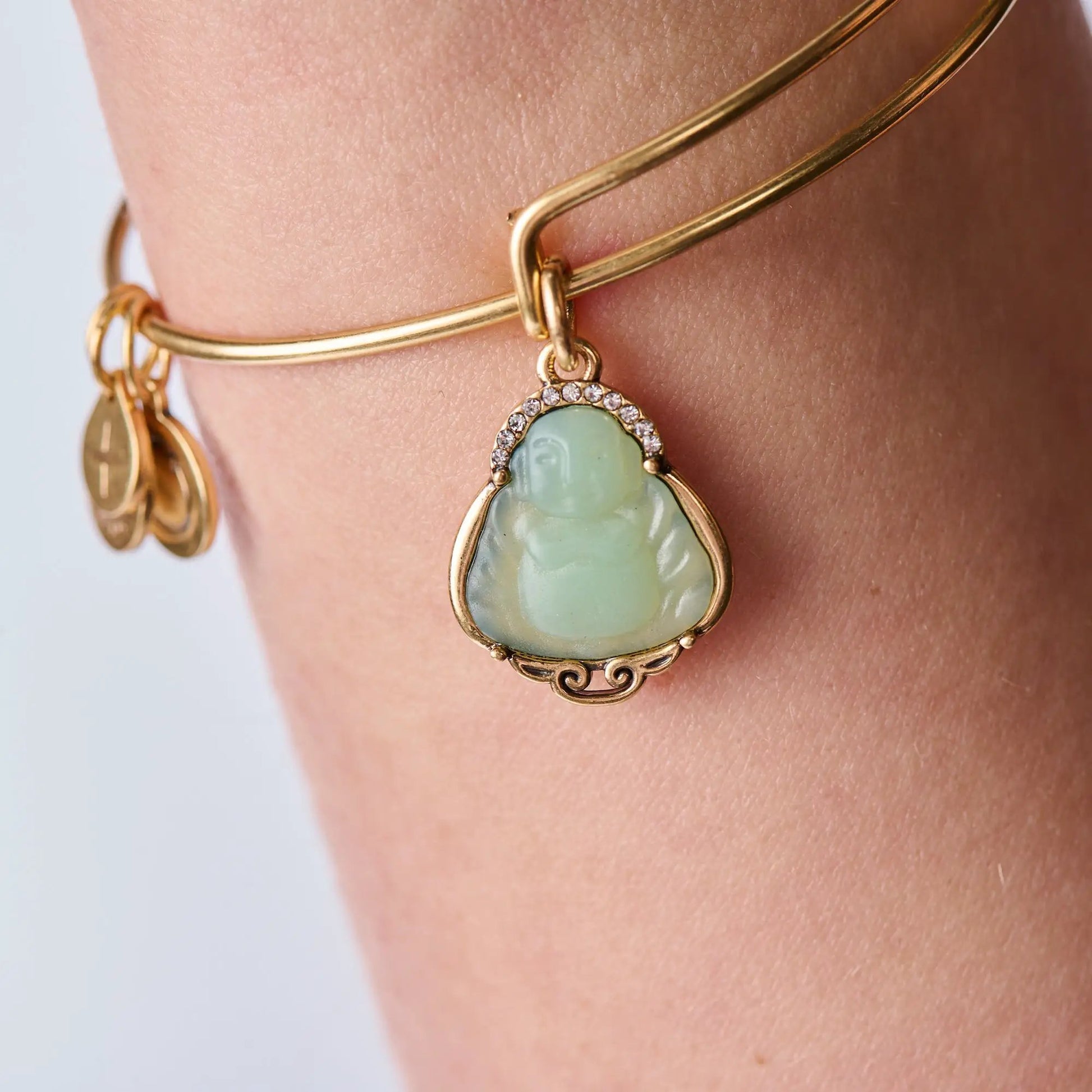Buddha Charm Bangle by ALEX AND ANI with gold-tone Buddha pendant surrounded by crystals on Tampa Home & Garden Store