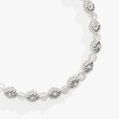 Pumpkin + Crystal Beaded Bangle with clear faceted beads and silver flower spacers on Tampa Home & Garden Store