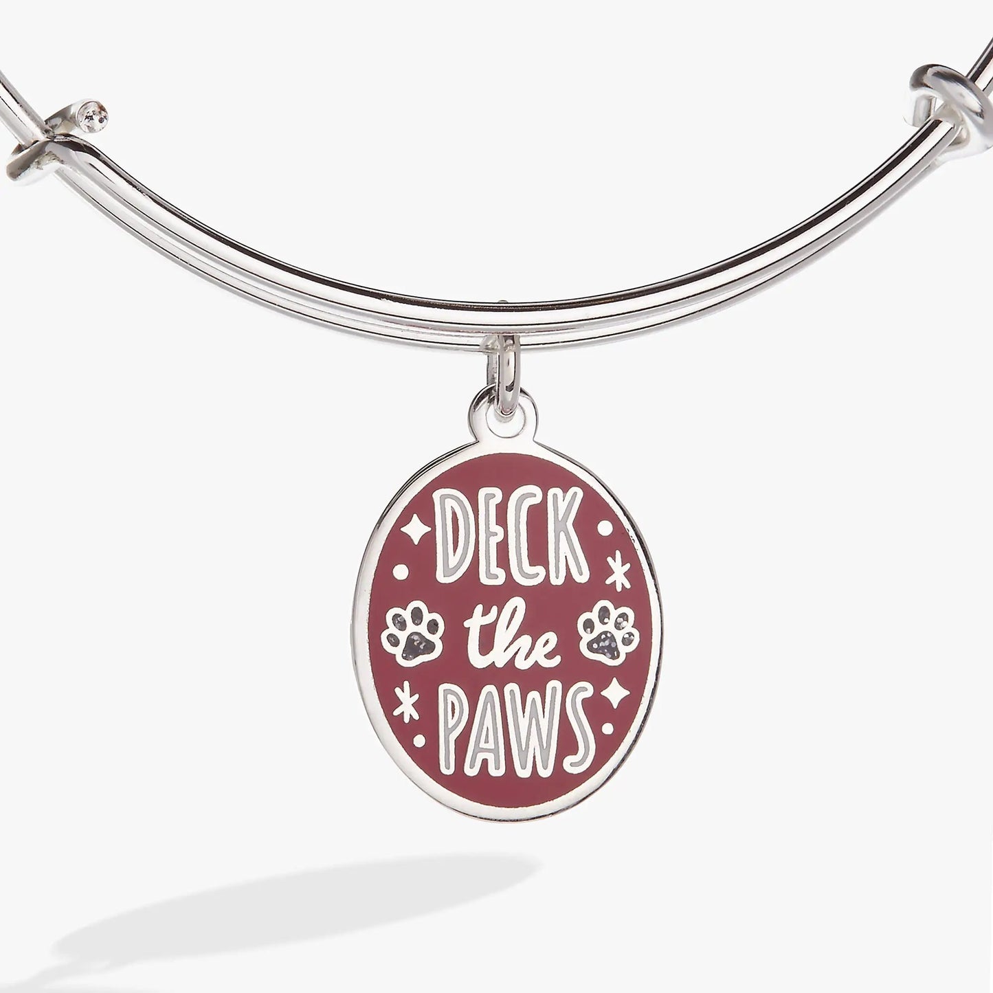 Deck the Paws Charm Bangle, silver tone bracelet with maroon pendant and paw prints on Tampa Home & Garden Store