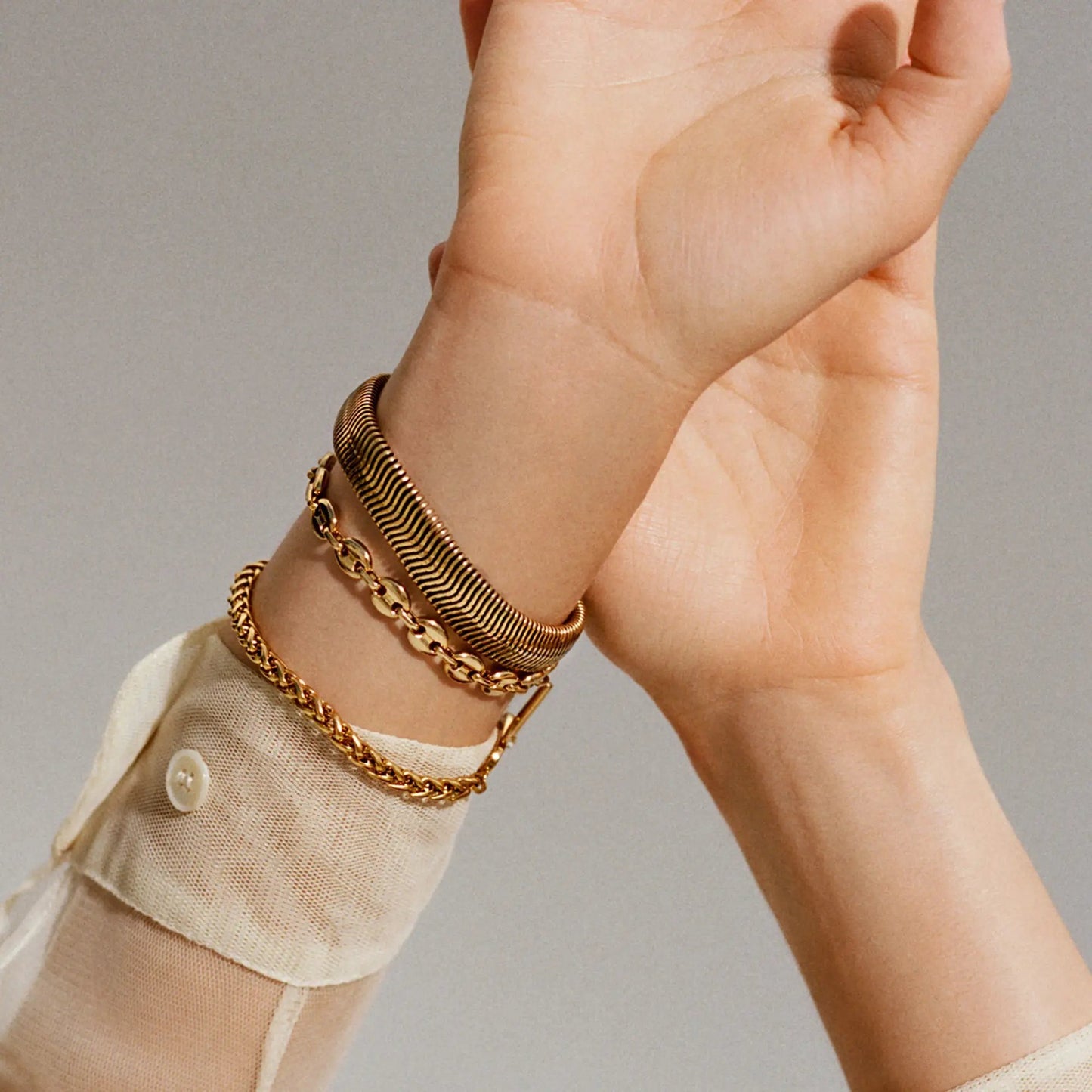 Mariner Chain Bracelet by ALEX AND ANI gold-tone ribbed finish on wrist with other bracelets on Tampa Home & Garden Store