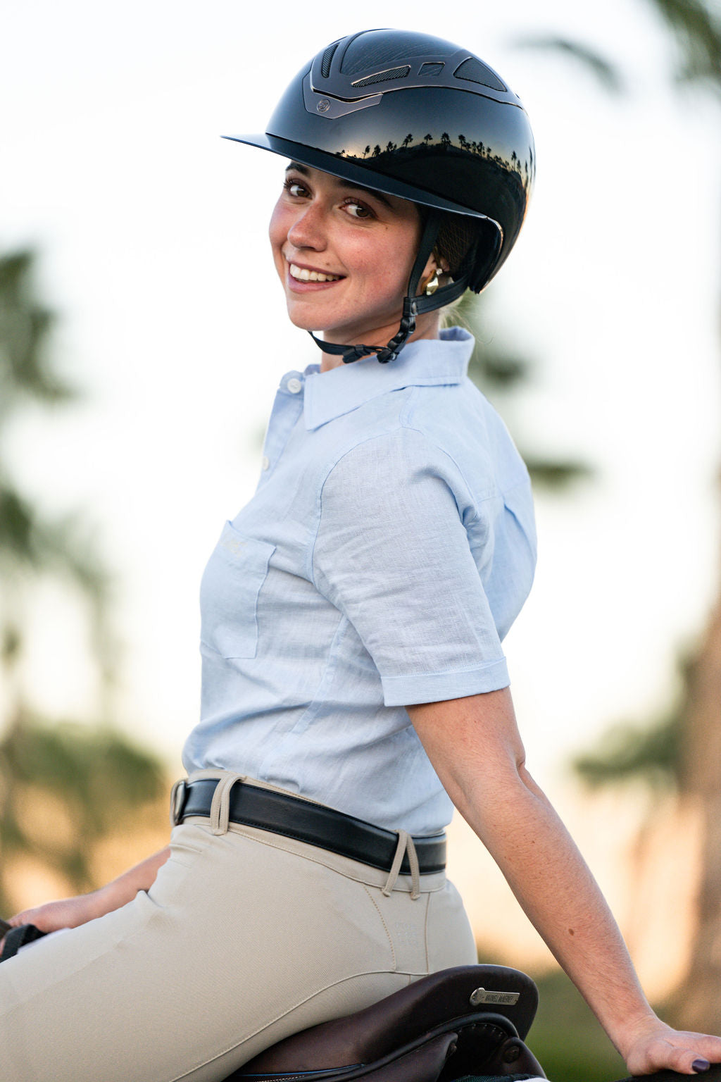 MICHELLE Linen Shirt by BellEq Equestrian, light blue linen shirt worn by rider on Tampa Home & Garden Store