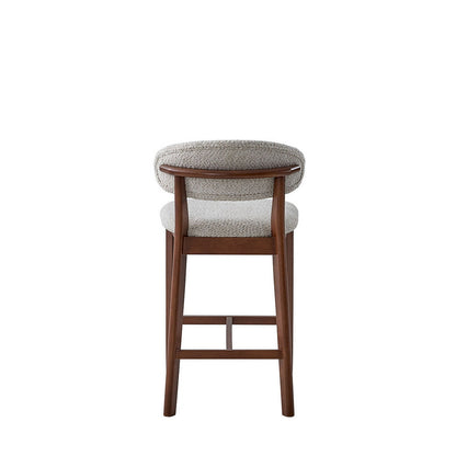 ACTU Counter Stool 26 in upholstered bar stool in warm walnut with beige boucle on Tampa Home & Garden Store