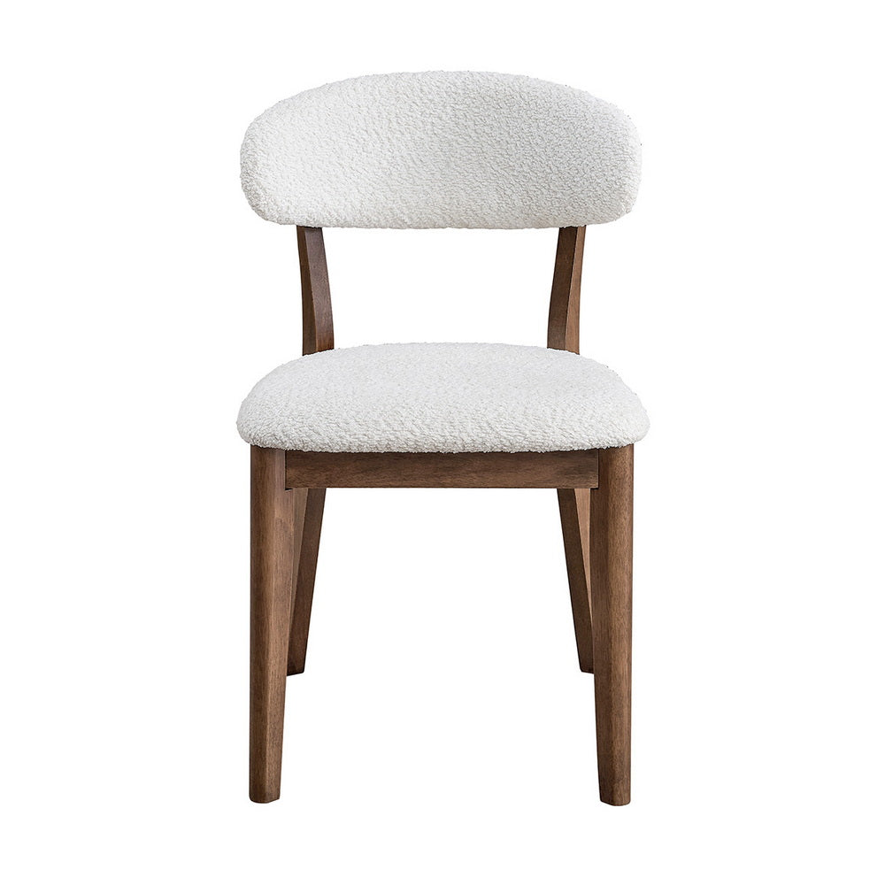 ACTU dining chair with white boucle upholstery and wooden legs on Tampa Home & Garden Store
