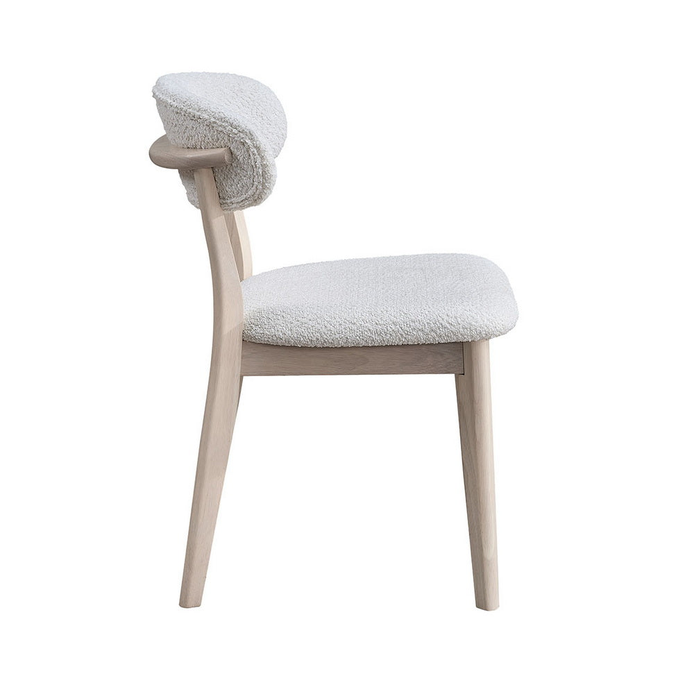 Scandinavian ACTU FURNITURE dining chair with natural wood legs and cream boucle upholstery on Tampa Home & Garden Store