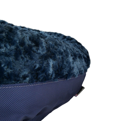 Round bolstered dog bed with navy plush fur exterior and woven base Furvana by American Dog on Tampa Home & Garden Store