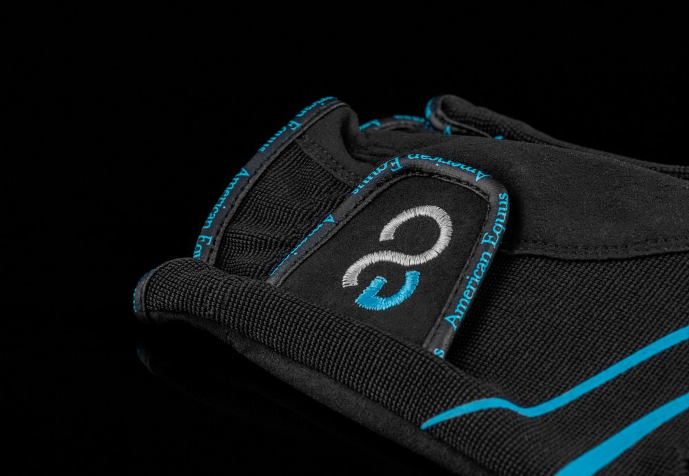 American Equus UltraFeel riding gloves, black with blue piping and logo patch on Tampa Home & Garden Store