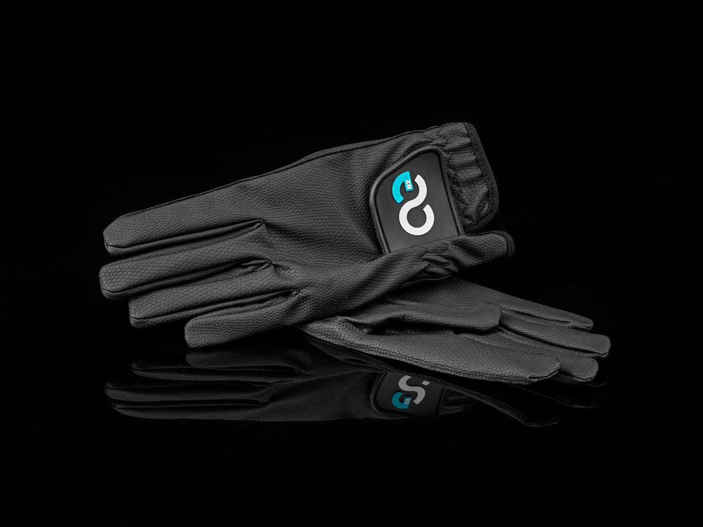 American Equus Ultra-Thin EquiFeel riding gloves in black textured material with logo patch on Tampa Home & Garden Store