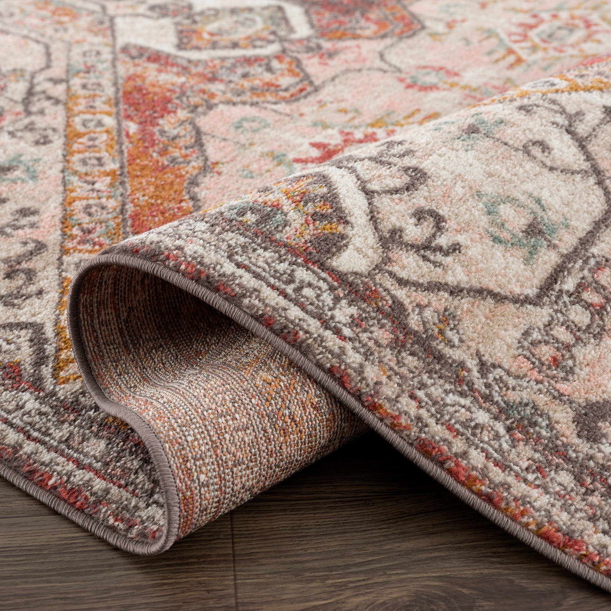 Yennora Area Rug - clearance by Boutique Rugs; floral pattern in pink/cream/teal with rolled edge on Tampa Home & Garden Store