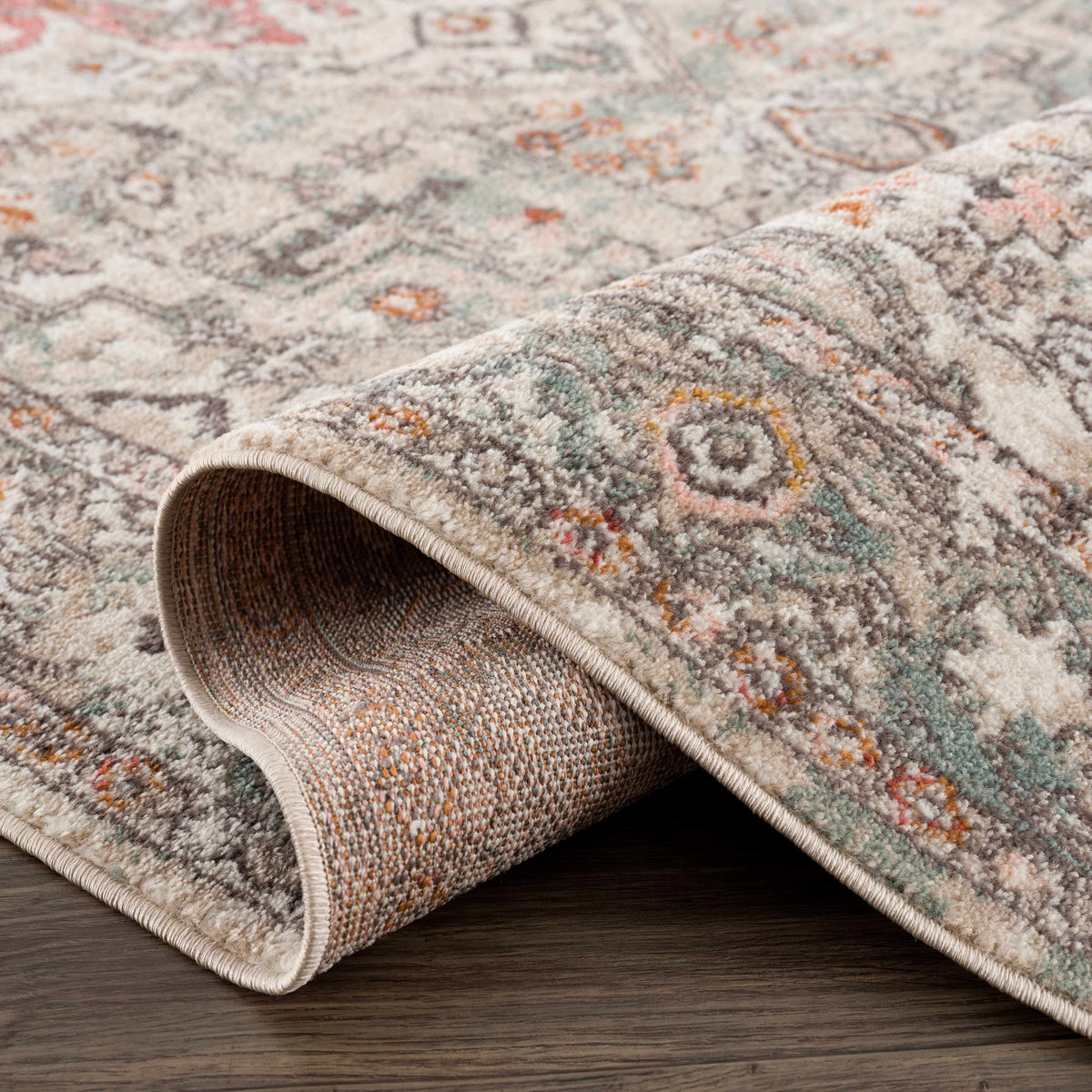 Bolinas Area Rug by Boutique Rugs beige with gray-pink pattern, rolled edge on Tampa Home & Garden Store