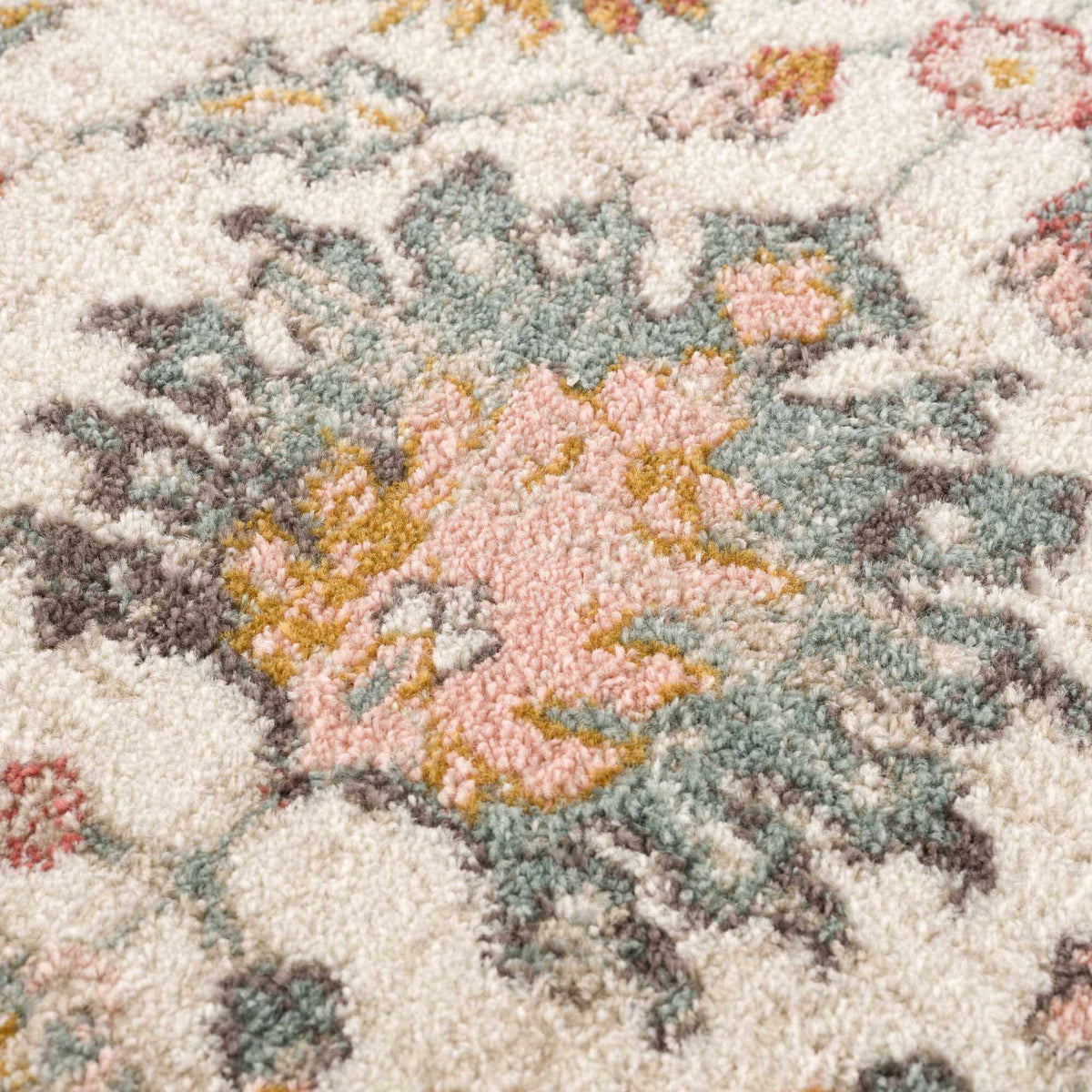 Twilight Floral Area Rug by Boutique Rugs, ivory base with pink, teal and mustard accents on Tampa Home & Garden Store