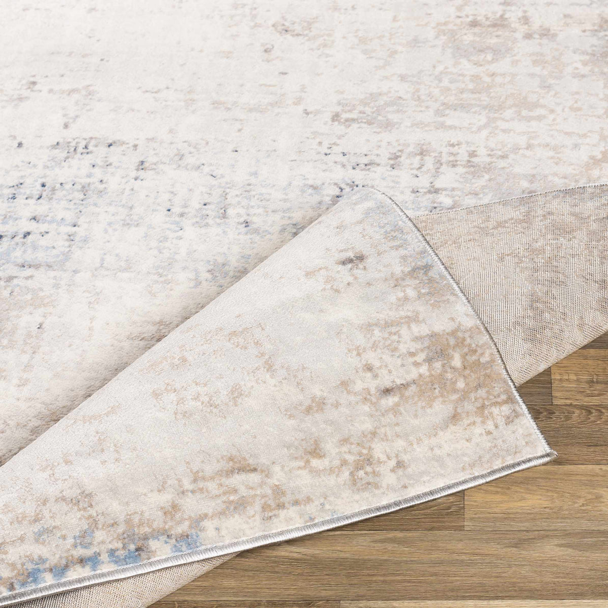 Alcove Abstract Area Rug by Boutique Rugs beige cream with pale blue accents on Tampa Home & Garden Store