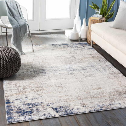 Alcove Abstract Area Rug by Boutique Rugs in soft gray with blue accents on Tampa Home & Garden Store
