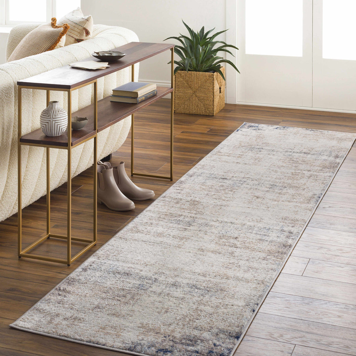 Alcove Abstract Area Rug by Boutique Rugs in cream with subtle gray-blue speckles on Tampa Home & Garden Store