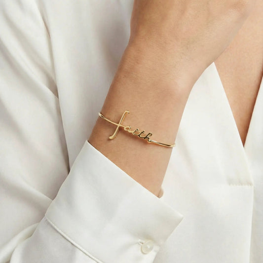 Faith In-Line Bracelet by ALEX AND ANI, gold-tone cross with script charm on wrist on Tampa Home & Garden Store