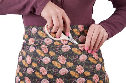 Gardener's Half Apron Womanswork floral print with pink blooms on dark fabric on Tampa Home & Garden Store