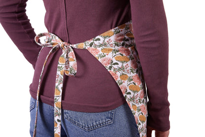 Gardener's Half Apron floral-print waist ties worn at the back on Tampa Home & Garden Store