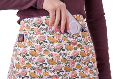 Gardener's Half Apron floral print by Womanswork with pocket and lavender phone tucked in on Tampa Home & Garden Store