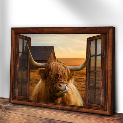 Highland Cow Window View Canvas Wall Art in a rustic wood frame with a long-horned cow at sunset on Tampa Home & Garden Store