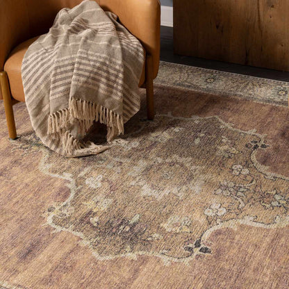 Powhatan washable area rug by Boutique Rugs in warm beige taupe with vintage floral border on Tampa Home & Garden Store