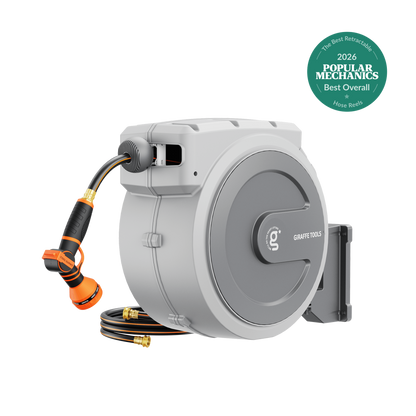 Retractable Garden Hose Reel by Giraffe Tools, gray unit with orange nozzle, 65ft-155ft capacity on Tampa Home & Garden Store