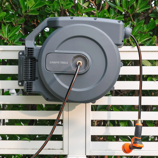 Retractable Garden Hose Reel by Giraffe Tools; gray housing with orange and black hose on Tampa Home & Garden Store