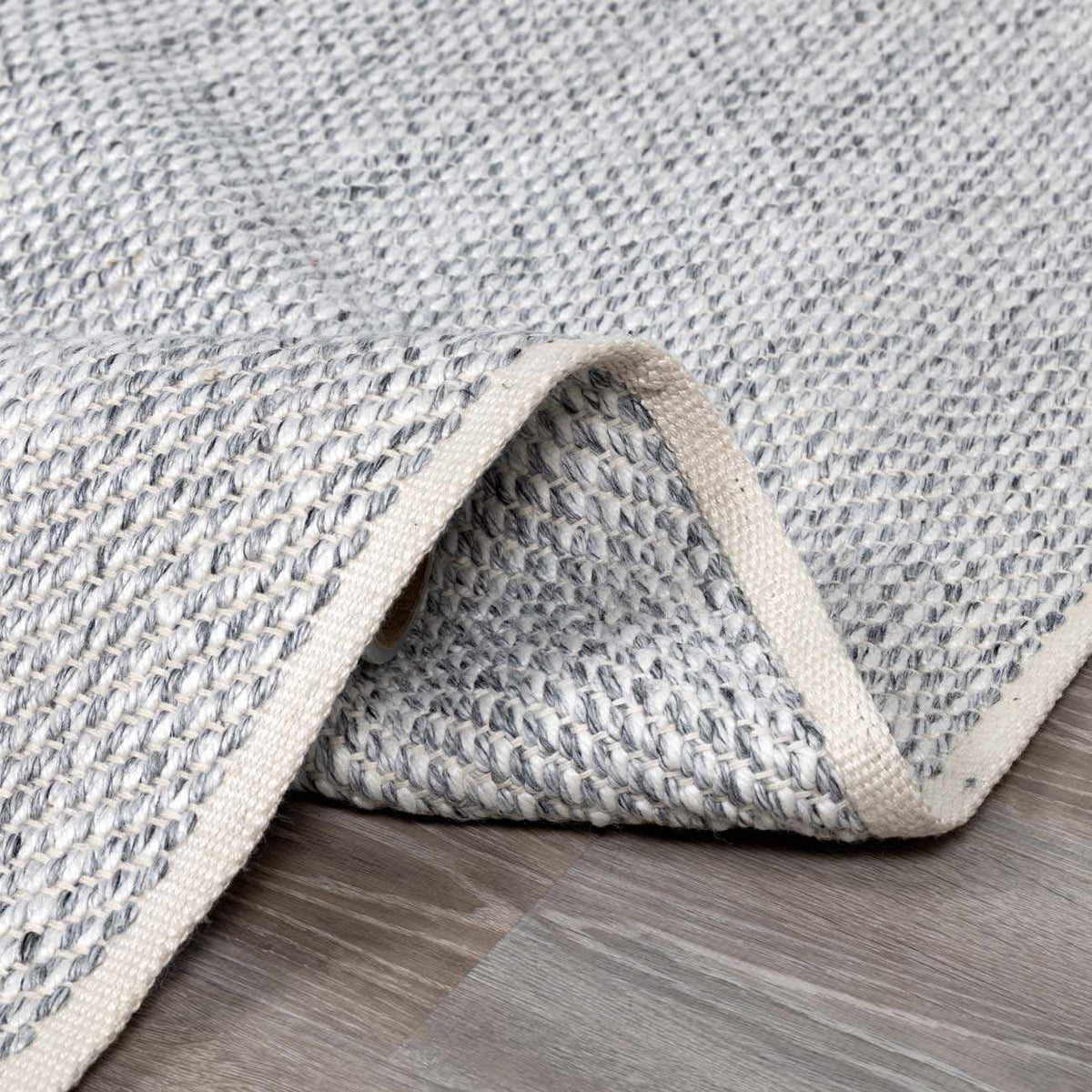 Stenhousemuir Luxe Handmade Rug grey-blue woven texture with cream binding Boutique Rugs on Tampa Home & Garden Store