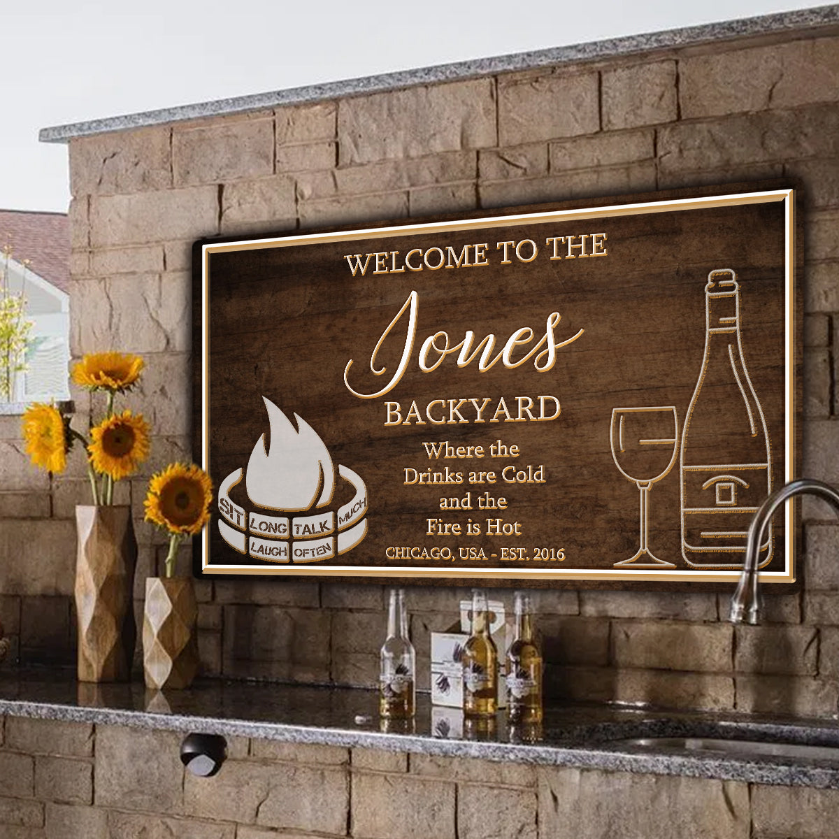 Backyard Sign canvas in brown wood with gold frame, campfire logo and wine bottle graphic on Tampa Home & Garden Store