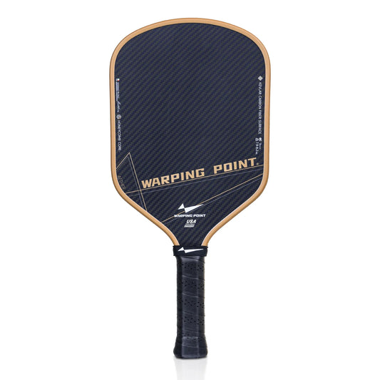 Warping Point Aether Pickleball Paddle Hybrid with dark carbon face and tan edge, black grip on Tampa Home & Garden Store