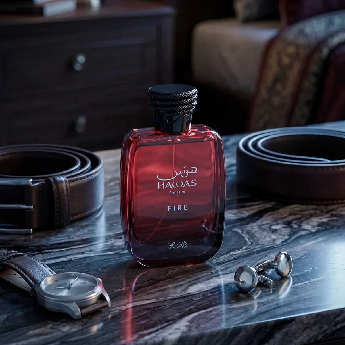Hawas Fire bottle by Silcy Skin, red glass with rope cap, Arabian woody scent on marble desk on Tampa Home & Garden Store