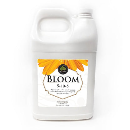Bloom 5-10-5 fertilizer by Rivendell Distribution, white plastic jug with orange flower label on Tampa Home & Garden Store